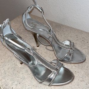 Metallic silver high heels from Giuseppe Zanotti w/crystal encrusted strapping